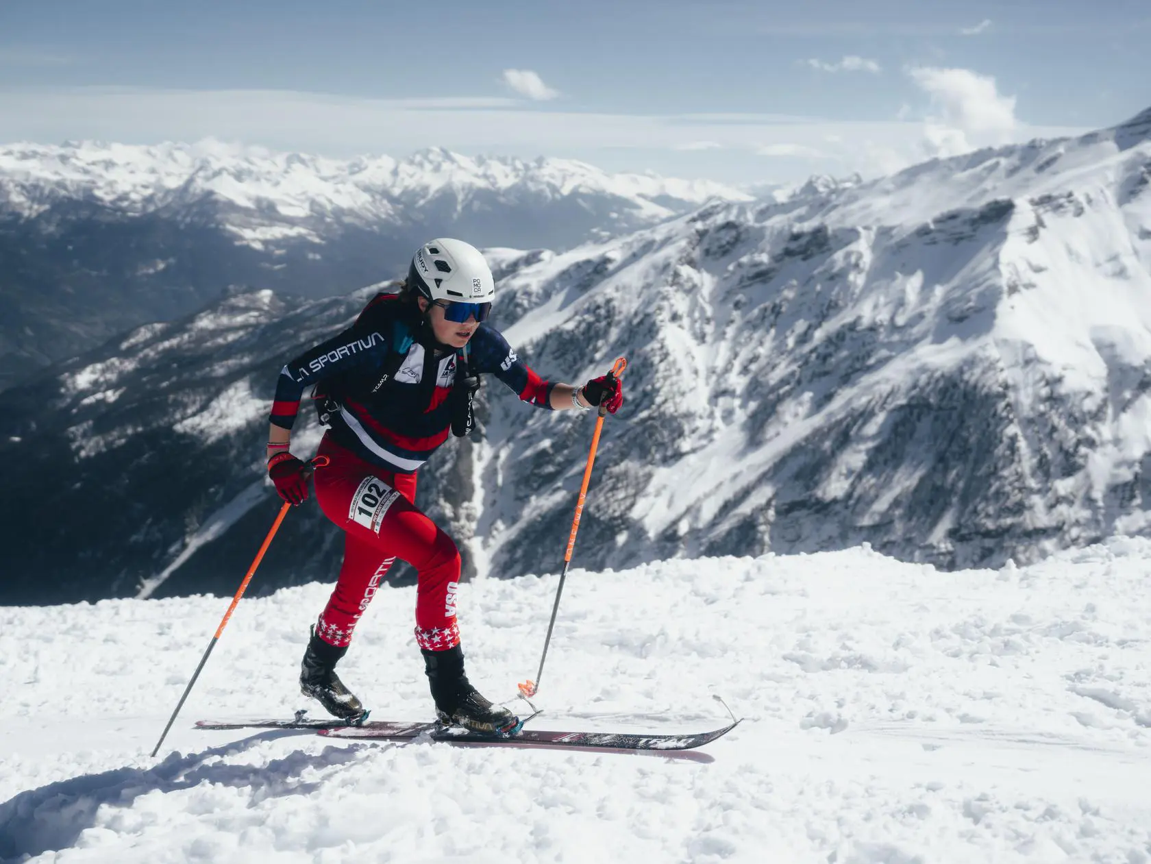 Female ski mountaineer on a steep slope