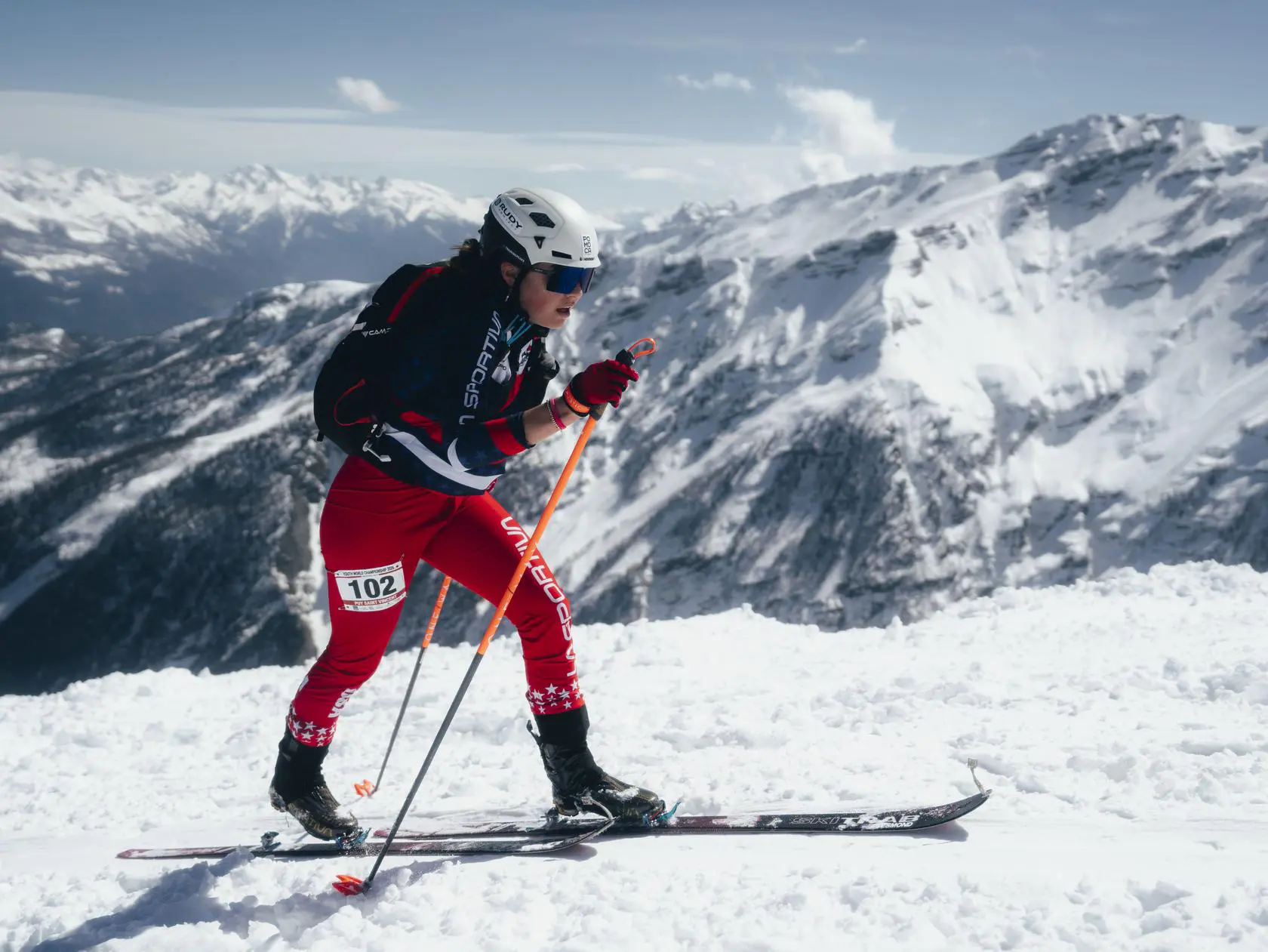 Athlete ski racing on a snowy mountain