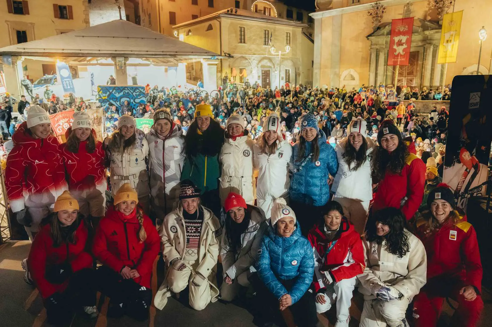 Ski mountaineering team in winter gear smiling
