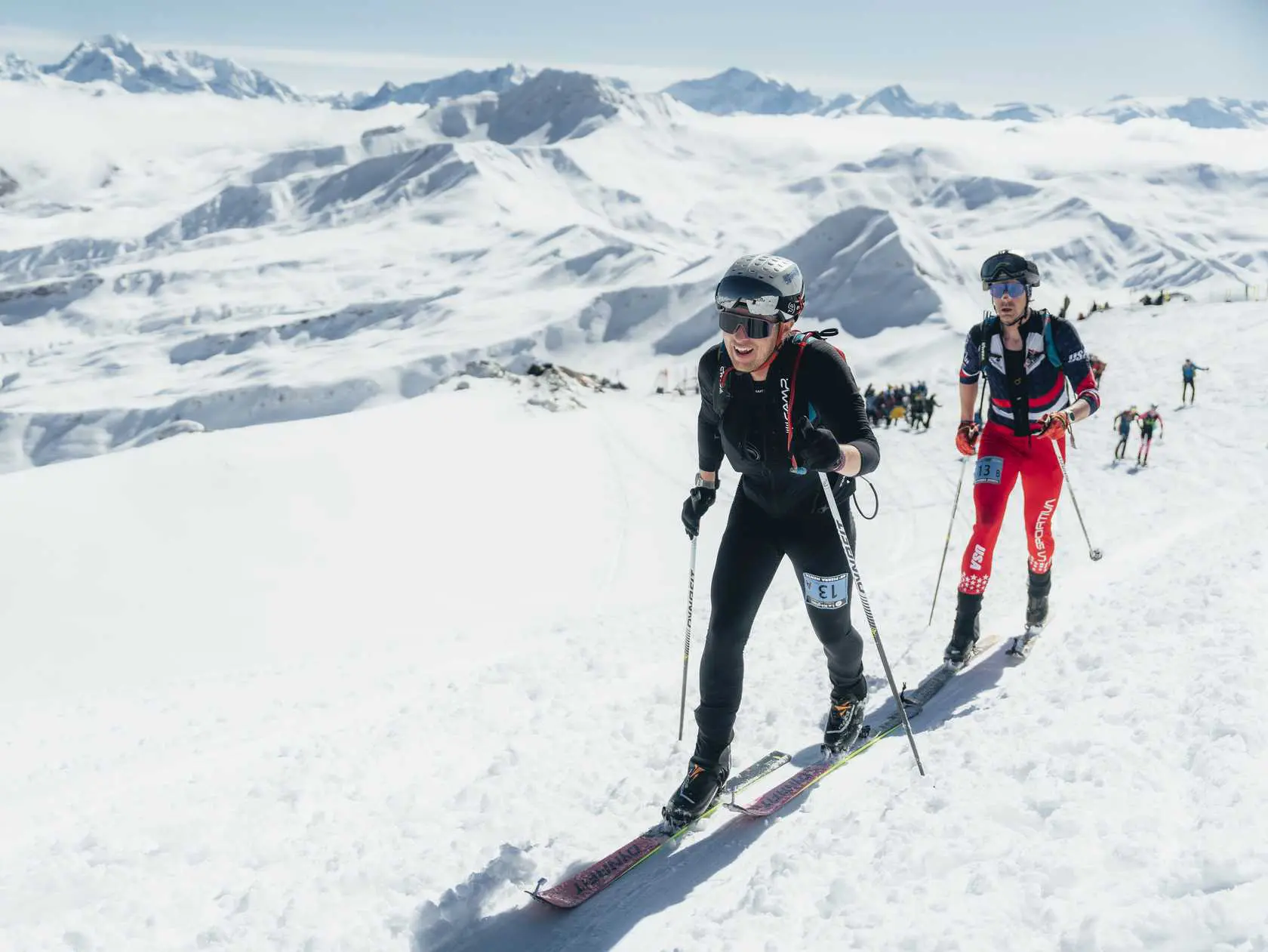 Ski mountaineers racing uphill