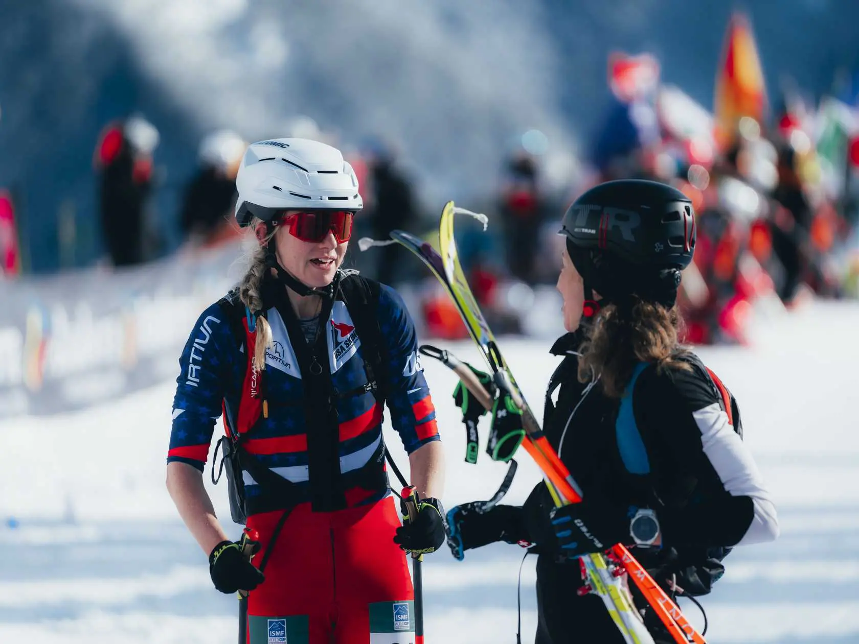 Women ski touring in snow