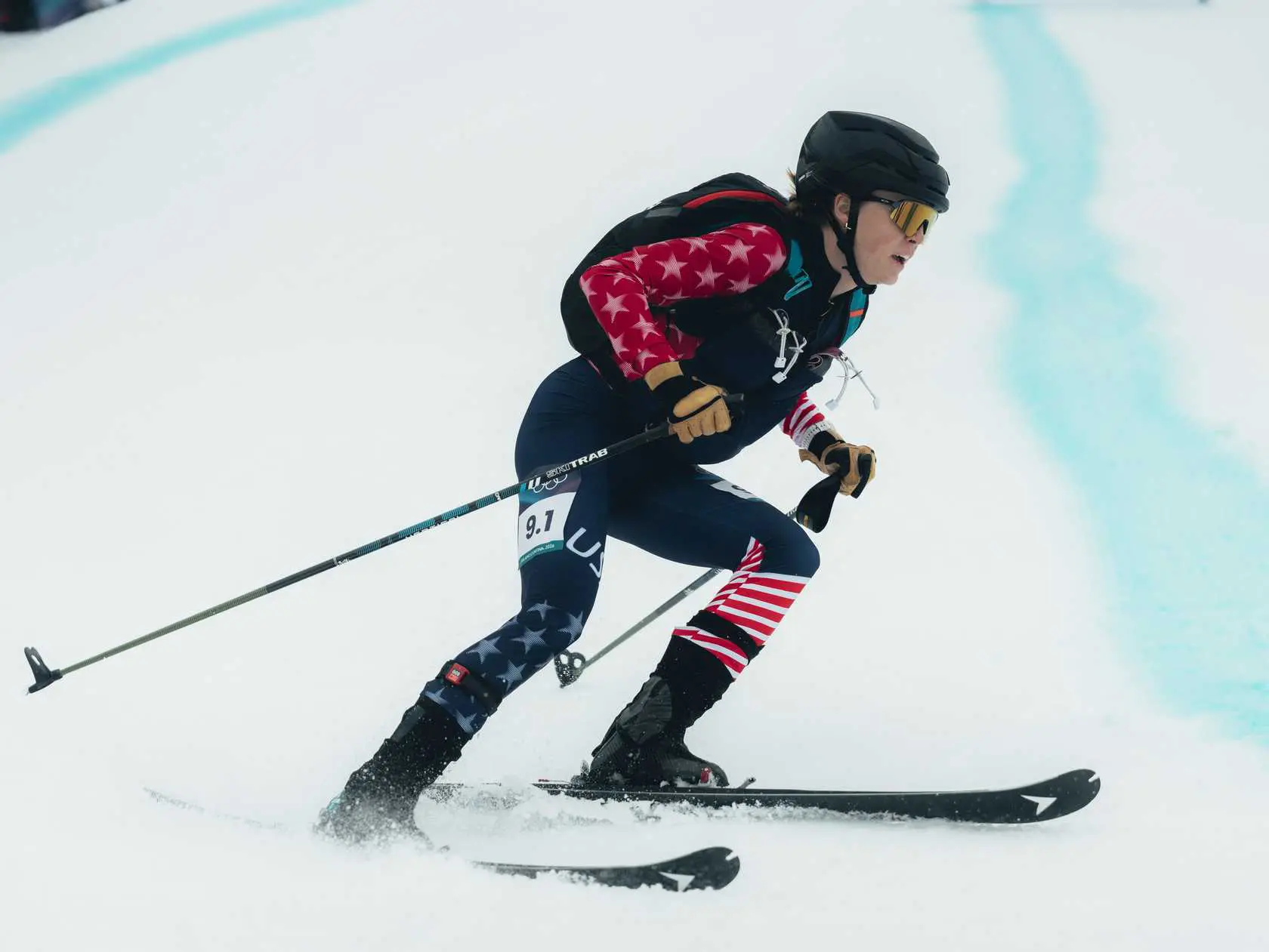 Athlete skiing in American flag suit