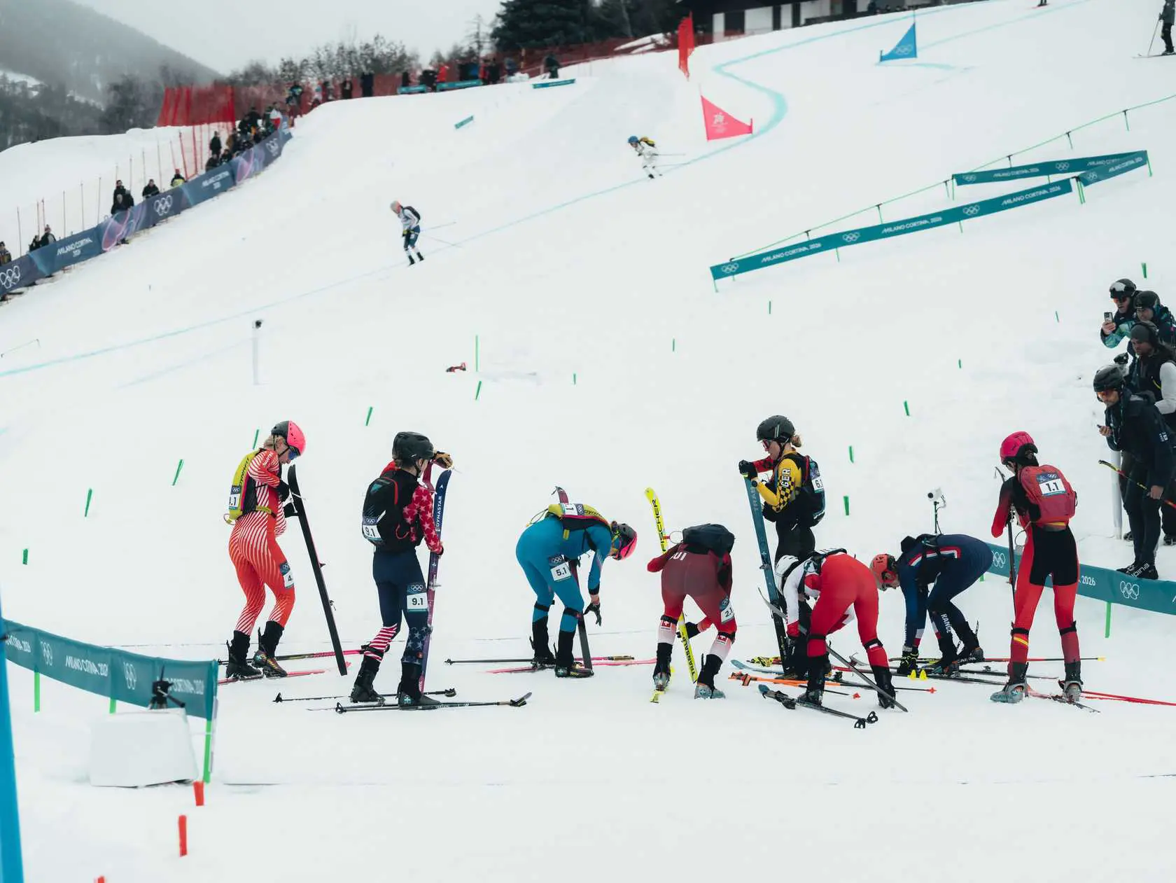 Women's ski team on snowy mountain