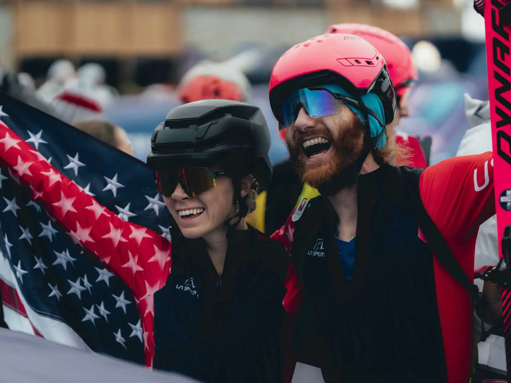 Happy skiers with American flag