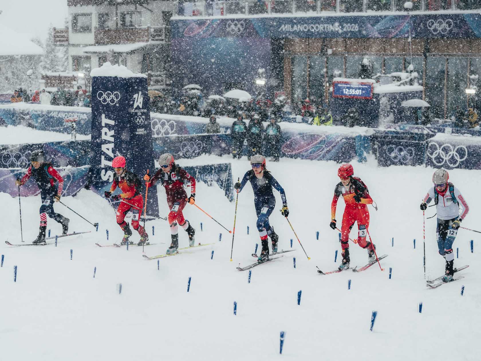 Ski mountaineering race start in heavy snow