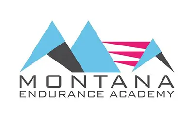 Montana Endurance Academy logo, which consists of a mountain range with the words "Montana Endurance Academy" written in bold