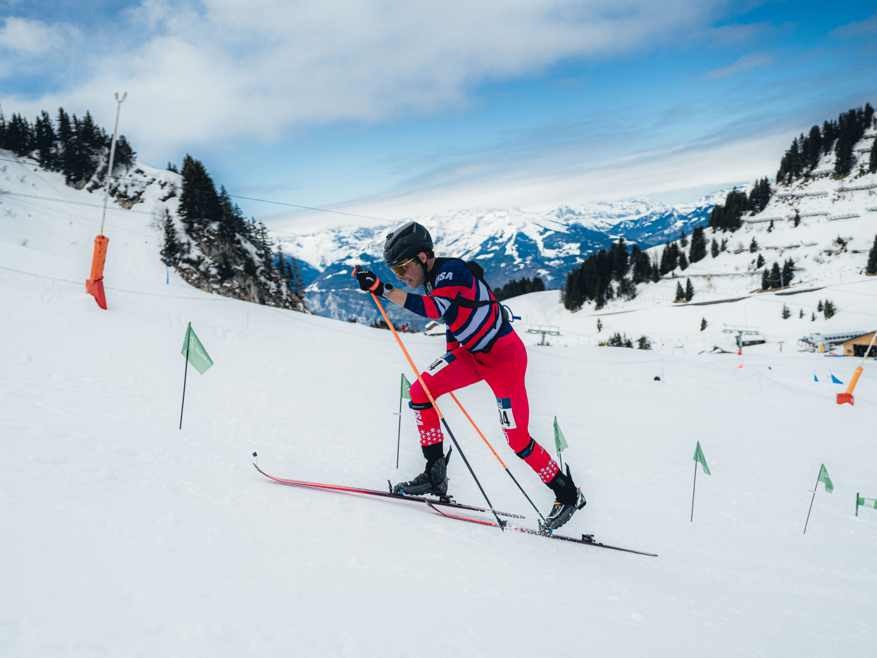 Athlete in red ski suit